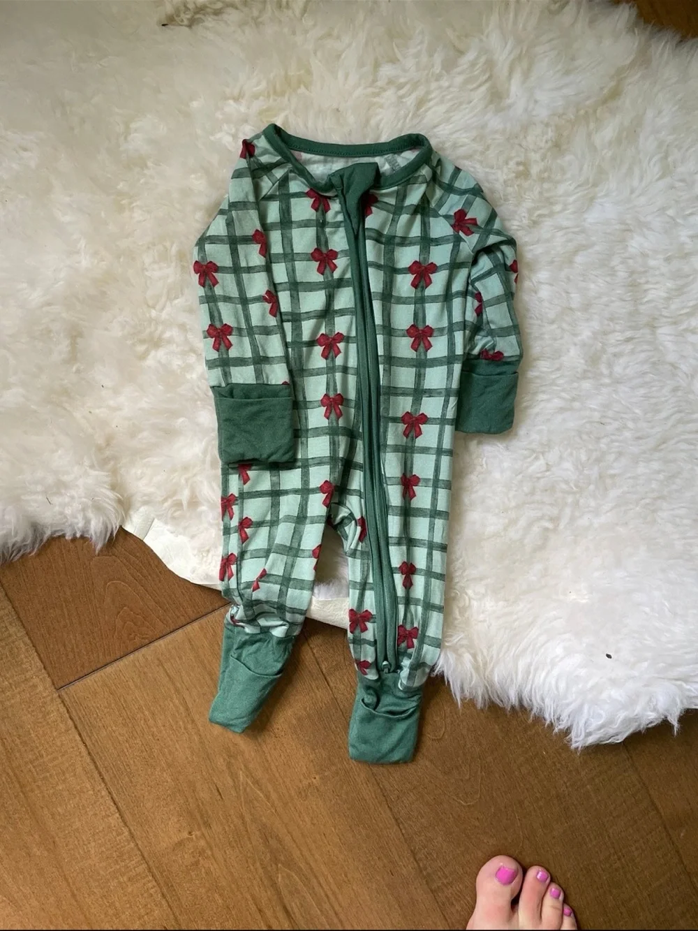 Green Plaid Footed Baby One-Piece with Red Bow Accents